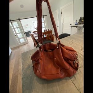 B. Makowsky Original Hobo Style Deep Orange Rust Purse  Cheetah print inside